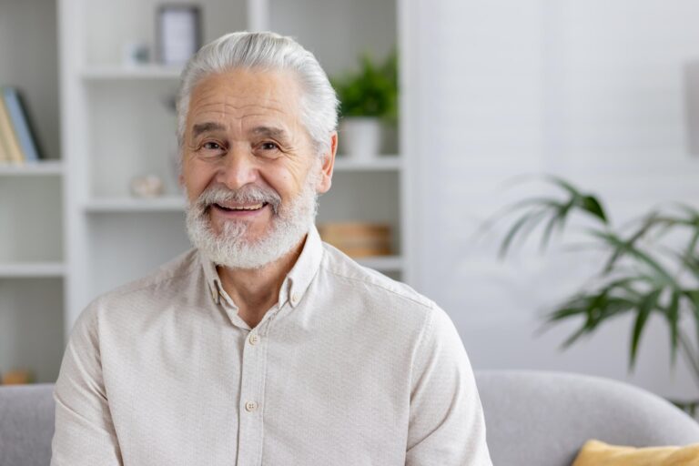 Cheerful Elderly Man Smiling inside an Independent Living Facility