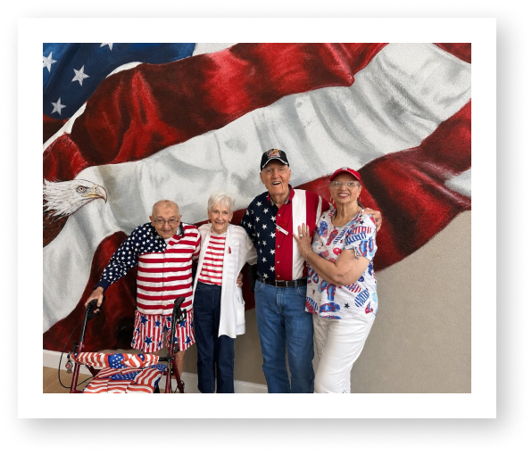Elderly Residents Celebrating Patriotic Holidays Together at a Memory Care Community