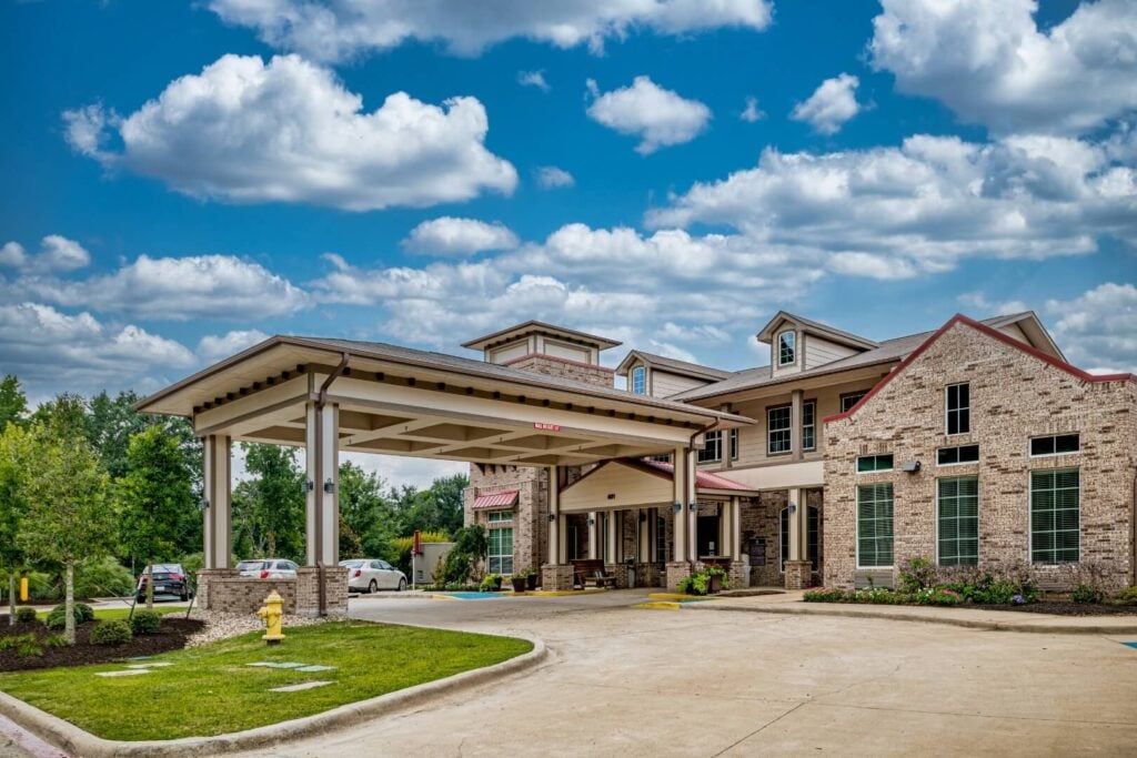 Welcoming Front Entrance and Covered Drop-Off at an Independent Living Facility