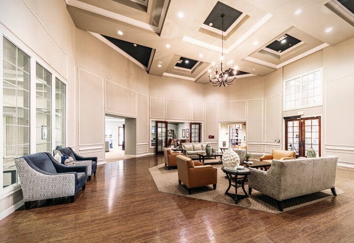 Elegant and Spacious Community Lobby Welcoming Residents at an Assisted Living Facility Elegant and Spacious Community Lobby Welcoming Residents at an Assisted Living Facility